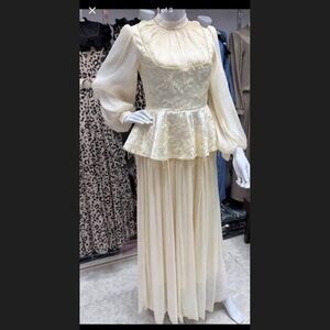 Elegant Cream Lace Peplum Gown